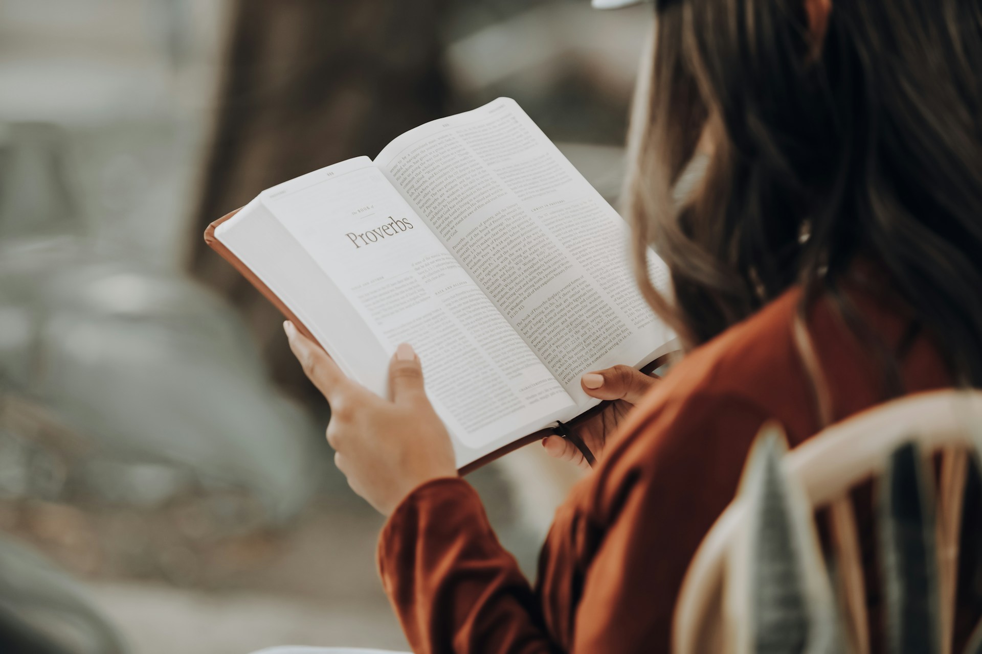 A woman reading Scripture in a quiet moment